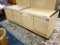 WOOD GRAIN LAMINATE CREDENZA; HAS 2 SETS OF LOCKING SLIDING DOORS ON FRONT (CABINET IS LOCKED ON