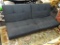 FUTON; UPHOLSTERED FUTON/CONVERTIBLE COUCH WITH DARK GRAY METAL FRAME, BLACK STITCHED LINEN LIKE