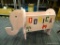 PINK ELEPHANT SHAPED TOY BOX; THIS LOT IS A PAINTED WOODEN PINK ELEPHANT TOY BOX. IT HAS AN OPEN