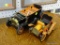 VINTAGE TIN TOY CARS; TOTAL OF 2 PIECES. LARGER IS BLACK WITH ORANGE TRIM, CONVERTIBLE, AND MEASURES