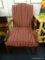 WOODEN ARMCHAIR WITH BURGUNDY STRIPED BACK AND SEAT; 
