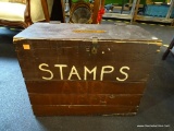 VINTAGE WOODEN STAMPS BOX; DARK BROWN IN COLOR WITH TAN PAINTED LETTERING ON FRONT WHICH READS