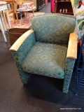 HOTEL-QUALITY ARMCHAIR; LIGHT AND DARK GREEN DAMASK PRINT UPHOLSTERY WITH BLONDE WOOD ARMS AND
