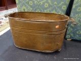 ANTIQUE COPPER BOILER; OVAL SHAPED WITH WOODEN HANDLES. HAS SIGNIFICANT WEAR COMPARABLE WITH PIECES