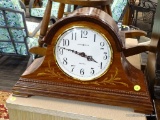HOWARD MILLER MANTLE CLOCK; MODEL #635-115, MARQUIS STYLE CLOCK. FINISHED IN WINDSOR CHERRY ON