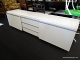 WHITE CONTEMPORARY CREDENZA; HAS 2 SIDE DRAWERS AND 3 FALL FRONT STORAGE AREAS. EACH DRAWER AND FALL