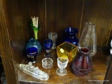 HALF SHELF LOT OF ASSORTED SMALL GLASS ITEMS; INCLUDES 12 TOTAL PIECES SUCH AS CRUISE SHIP, RED
