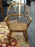 RAMSDELL WOODEN CHILD'S WINDOR ROCKING CHAIR; ROUNDED HOOP BACK WITH 5 VERTICAL BACK RODS ACROSS,