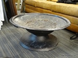 BLACK METAL ROUND FIRE PIT BOWL; BUILT IN PEDESTAL STAND, HAS ROUND GRATE INSIDE. MEASURES 30 IN