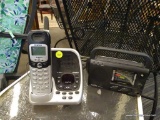 SMALL ELECTRONICS LOT; TOTAL OF 2 ITEMS. ONE IS A UNIDEN CORDLESS PHONE AND BASE (GREY AND BLACK IN