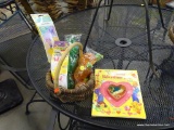 EASTER BASKET LOT; THIS LOT CONTAINS A SMALL WOODEN BASKET, A PACK OF FROG EGGS, A PACK OF CARROT