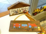 SET OF WOODEN WALL HANGINGS. THIS LOT INCLUDES TWO WOODEN WALL PLAQUES. ONE HAS HAND PAINTED BLUE
