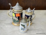 3 MINIATURE STEINS; 1 IS MADE IN GERMANY WITH PEWTER LID, 1 HAS A PEWTER LID WITH NUREMBERG PAINTED