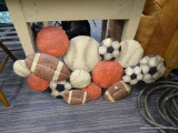 DECORATIVE METAL SPORTS BALLS WALL DECOR; THIS METAL PIECE IS MADE UP OF METAL BALLS FROM DIFFERENT