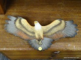 HAND PAINTED MODEL BALD EAGLE; THIS IS A HAND PAINTED BALD EAGLE MODEL THAT HANGS ON A WALL. MADE BY