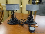 SET OF BOSE AUDIO SPEAKERS; THIS LOT INCLUDES 2 BOSE AUDIO SPEAKERS ON STANDS. POSSIBLY FOR A