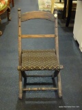 VINTAGE WOODEN FOLDING CHILD'S CHAIR WITH FABRIC SEAT PANEL; RIVETED DETAIL ON THE FRAME. DOUBLE