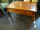 QUEEN ANNE END TABLE; ONE OF A PAIR. RECTANGULAR SHAPED WOODEN TABLE IN A MAHOGANY FINISH, WITH