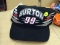 **SIGNED** BURTON #99 RACING CAP; #99 BURTON RACING CAP. IS SIGNED UNDER THE BILL OF THE HAT IN