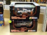 (R1) 2 PIECE LOT; INCLUDES TWO 1:43 SCALE DIE-CAST REPLICA PIT STOP SHOWCASE FIGURINES. BOTH ARE OF