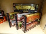 HALF SHELF LOT OF NASCAR TRAILER RIGS; INCLUDES SEVEN 1:64 SCALE TRAILER RIGS (BRAND NEW IN THE