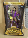 (R3) WWE DEFINING MOMENTS WRESTLING FIGURINE; 