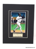 HAND SIGNED KEN GRIFFEY JR. MATTED PHOTO. COMES WITH CERTIFICATE OF AUTHENTICITY. MEASURES 8 IN X 10
