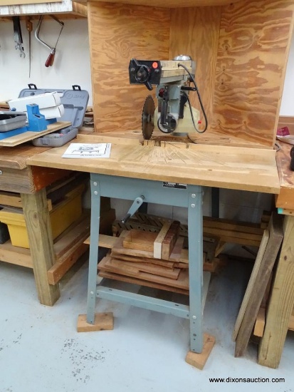 DELTA RADIAL ARM SAW; MODEL 10 DELUXE RADIAL ARM SAW WITH AUTOMATIC BRAKE BY DELTA. SERIAL #