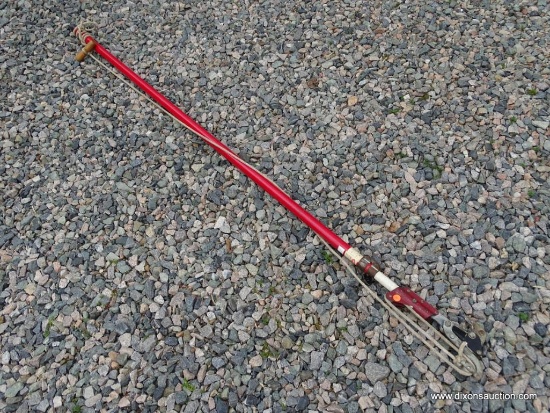 TREE TRIMMER; RED AND WHITE EXTENDABLE POLE WITH MANUAL TRIMMING ATTACHMENT. MEASURES 80 IN.