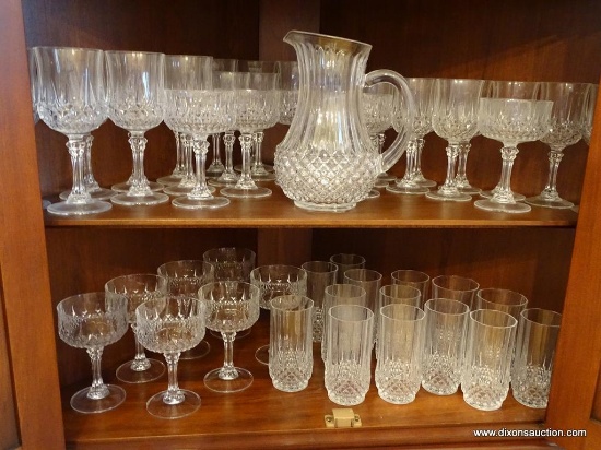 (DR) CRYSTAL STEMWARE ( BOTTOM OF CORNER CABINET); 49 PCS. OF CRYSTAL STEMWARE AND MATCHING WATER