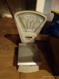 (ATT2) PITNEY-BOWES POSTAL SCALE; WHITE AND GREY IN COLOR, MEASURES 19 IN TALL.
