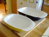 (KIT) 2 PIECE LOT; INCLUDES 2 ROSHCO CASSEROLE DISHES. 1 IS BLUE AND 1 IS YELLOW. INCLUDES A FLOWER