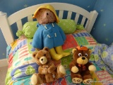 (DBED) PLUSH ANIMALS; 3 PLUSH BEARS- ONE IS A PADDINGTON BEAR, ONE IS A DAKIN AND THE OTHER BEAR