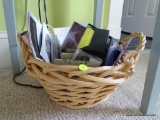 (DBED) BASKET LOT; INCLUDES VARIOUS RELIGIOUS BOOKS, MUSIC CDS, ETC CONTENTS.