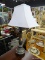 BRUSHED METAL TABLE LAMP; THIS TABLE LAMP HAS A RECTANGULAR SHAPED WHITE LAMP SHADE THAT SITS ON A