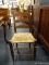 RUSH BOTTOM CHAIR; MAHOGANY LADDER BACK AND RUSHBOTTOM SIDE CHAIR. HAS A HAIRLINE CRACK ON THE TOP