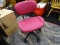 ROLLING OFFICE CHAIR; PINK AND BLACK IN COLOR WITH A LOW RISE BACK SUPPORT. IN EXCELLENT CONDITION!