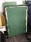 COLEMAN COT; GREEN AND DIAMOND PATTERN IN COLOR WITH A BLACK FRAME. HAS ORIGINAL LABELS. FITS UP TO