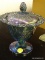 CARNIVAL GLASS LIDDED COMPOTE; HAS A GRAPE PATTERN WITH A PIERCED EDGING AND GRAPE CLUSTER FINIAL ON