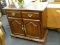 KINCAID SERVER; RECTANGULAR BEVELED TOP, LARGE CENTER DRAWER WITH BRASS BATWING PULLS THAT IS LINED