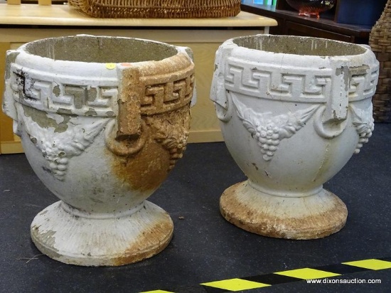 PAIR OF CONCRETE PLANTERS; ROUND WITH GREEK KEY BORDERS OVER GRAPEVINE PATTERNED SIDES AND FLUTED