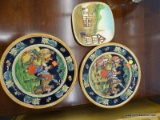 GERMAN POTTERY PLATES; TOTAL OF 3. 2 ARE LARGER AND ROUND, AND HAVE AN ASSEMBLY OF PEOPLE DANCING IN