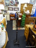 FLOOR LAMP; DARK BRUSHED GREY METALLIC COLOR, WITH SQUARE MOLDED BASE AT FLOOR. HAS FINIAL. TOTAL
