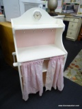 WHITE PAINTED CHILDS HUTCH; HAS CURTAIN FRONT WITH 1 INTERIOR SHELF AND 1 UPPER SHELF WITH BUILT IN