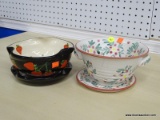 LOT OF 2 STRAINERS; 1 IS A FLORAL THEMED WITH MATCHING UNDERPLATE (MEASURES 9 IN DIA) AND 1 IS A