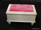 WHITE PAINTED CHILDS STOOL; HAS A PINK BUTTON TUFTED SEAT THAT LIFTS TO REVEAL A STORAGE AREA. SITS