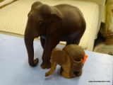 ELEPHANT LOT; INCLUDES 2 TOTAL PIECES (1 IS WOOD CARVED WITH POCKETS ON EITHER SIDE AND 1 IS SOLID