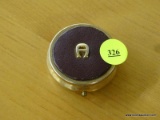 PILLBOX; MADE BY AIGNER WITH BURGUNDY LEATHER TOP AND BOTTOM AND BRASS ACCENTS. MEASURES 1.75 IN