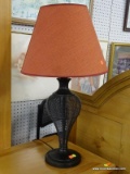 TABLE LAMP; BLACK WIRE AND URN SHAPED LAMP WITH RED BURLAP SHADE. MEASURES 7 IN X 29 IN