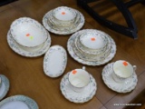 2 PIECE PLACE SETTING; MADE BY NORITAKE BONE CHINA IN THE BROOKHOLLOW PATTERN. INCLUDES 2 CUPS AND